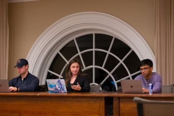 Connor Eads, Former Honor chair Gabrielle Bray, and Honor chair Hamza Aziz in the Trial Room